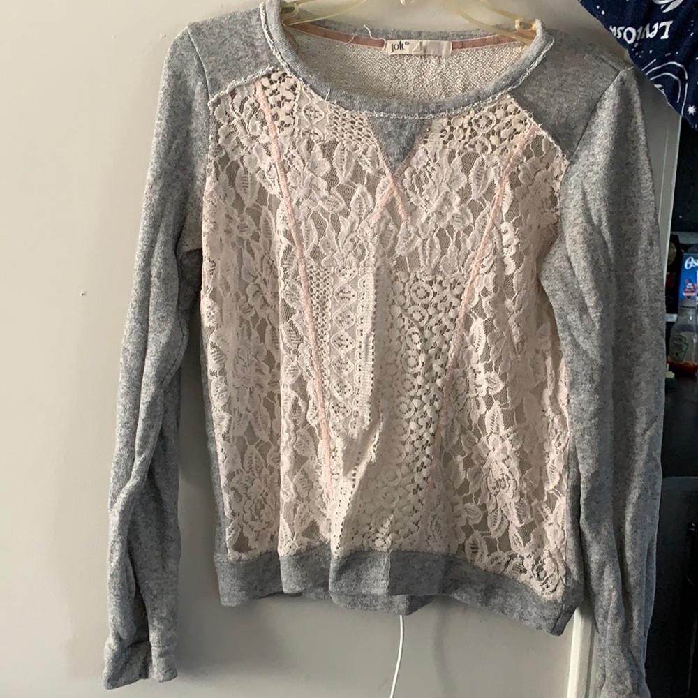 Three women sweaters
